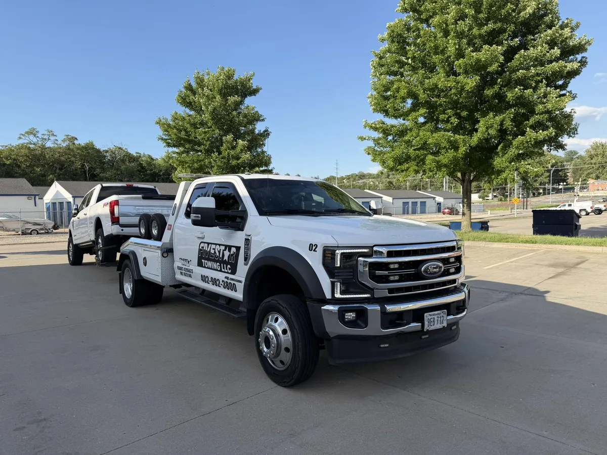 Integrated wrecker set up for a roadside vehicle tow on a residential street